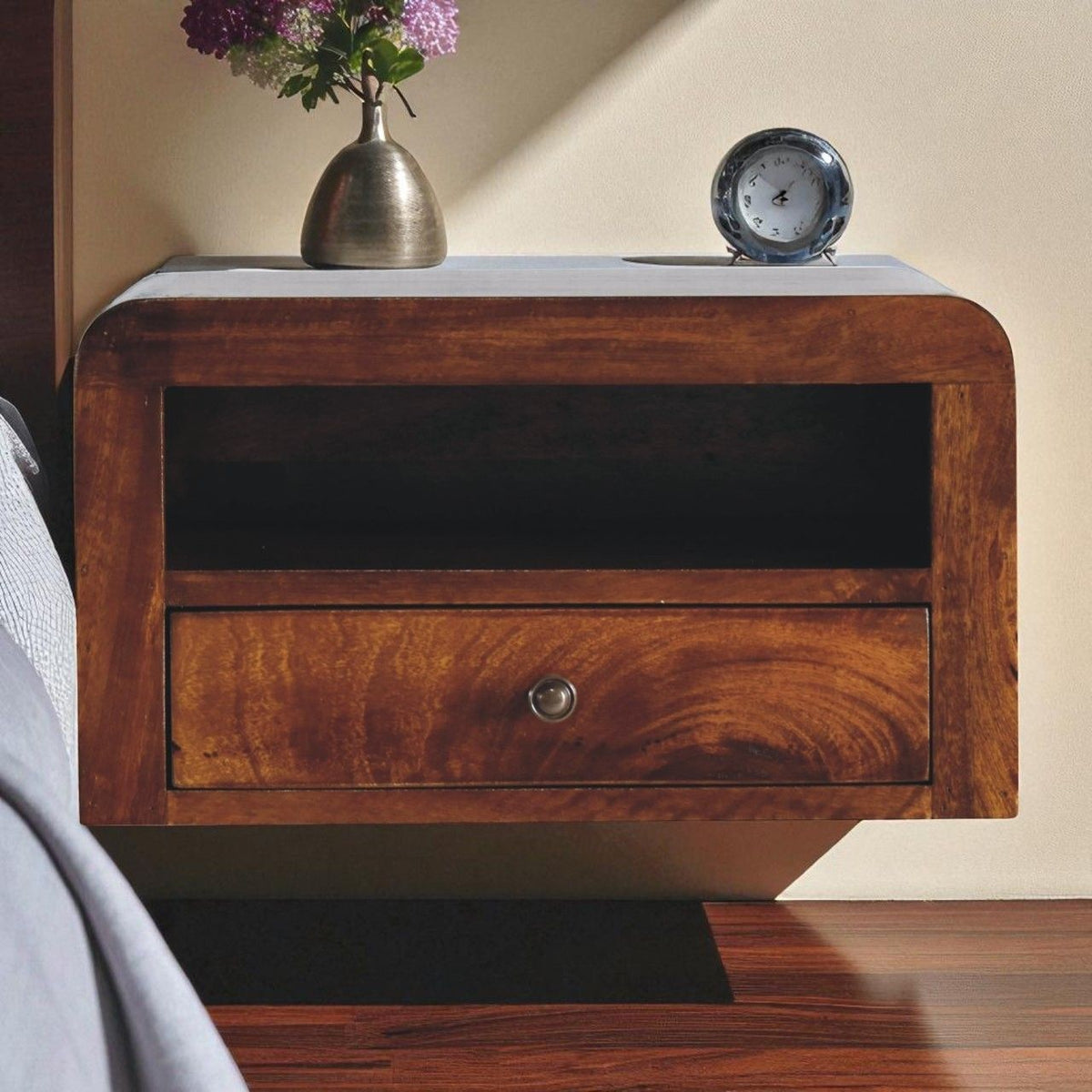 Floating bedside nightstand with open shelf and one drawer, dark brown wood finish.