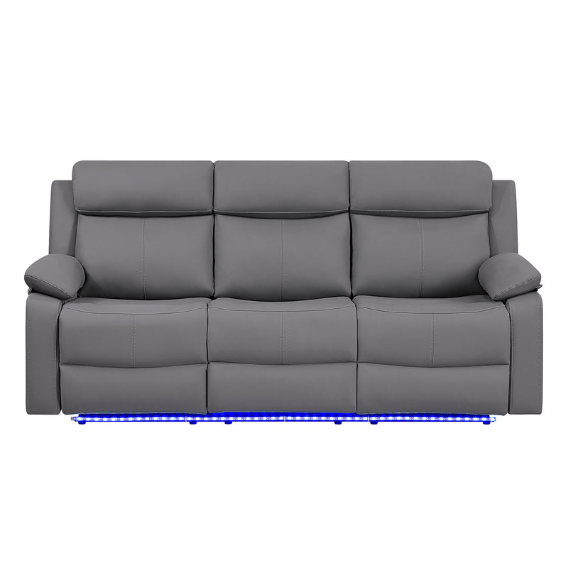 Dark gray reclining sofa with padded armrests and blue LED light strip along the base