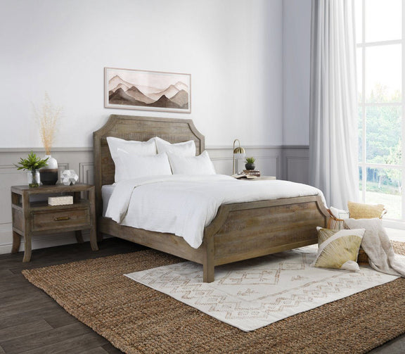White pillow sham on bed with textured woven fabric