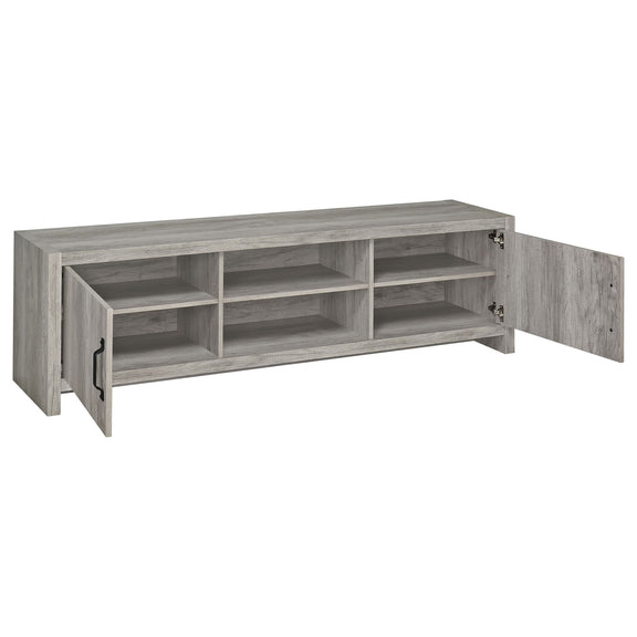 Gray TV stand with adjustable multi-compartment shelving and black pull handles