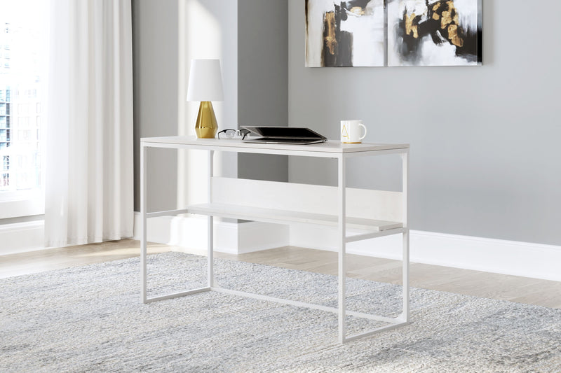 White home office desk with lower open shelf and metal frame