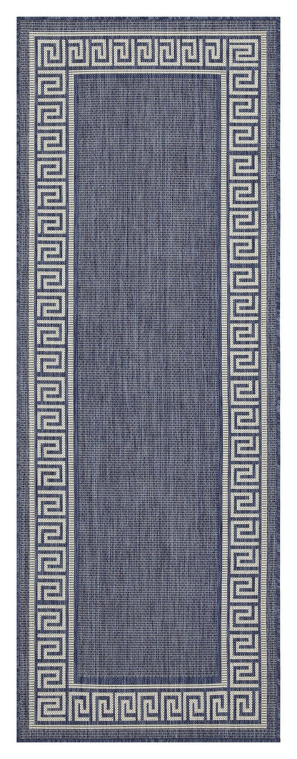 Indoor/outdoor area rug in blue with dark Greek key border and solid blue center