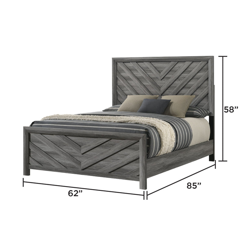 Dark gray chevron bed frame with low posts and layered pillows and blanket
