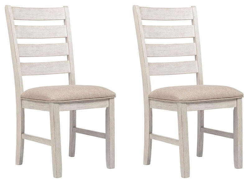 Pair of white dining side chairs with slatted backs and beige upholstered seats