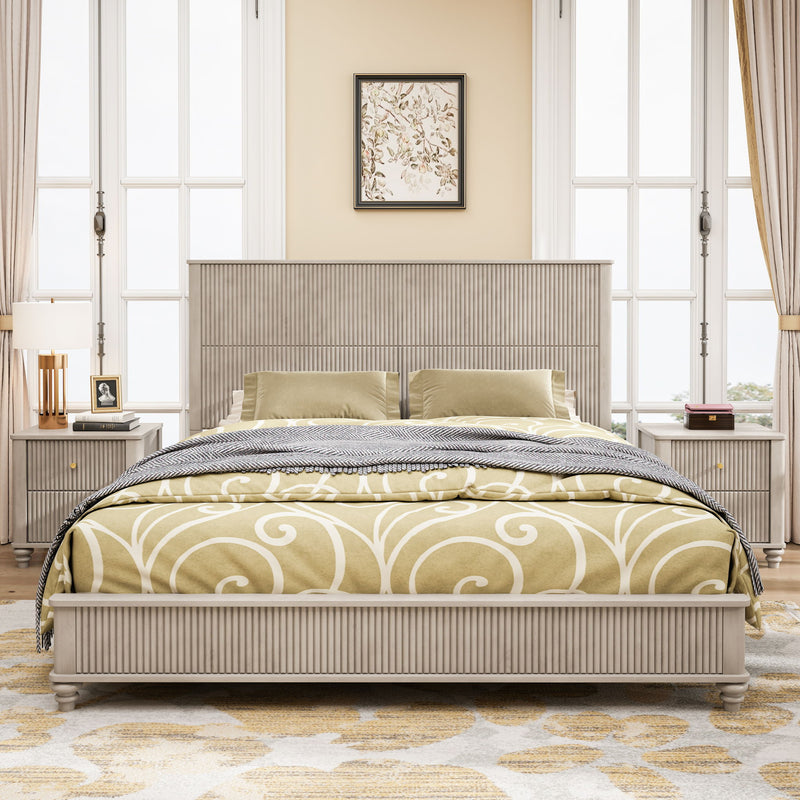 Light beige upholstered bed with slatted base, pillows and quilt, with two nightstands