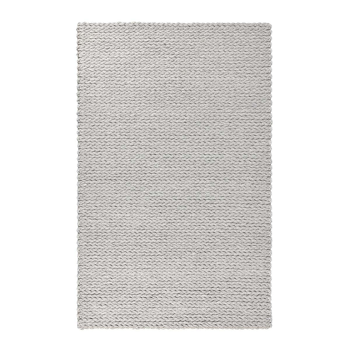 Gray wool area rug with dense woven design and short fringe around edges