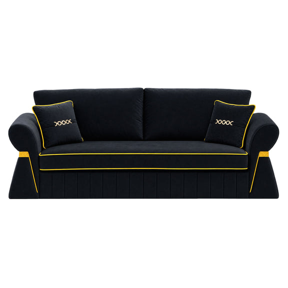 Black three-seat sofa with two cushions and gold-tone piping