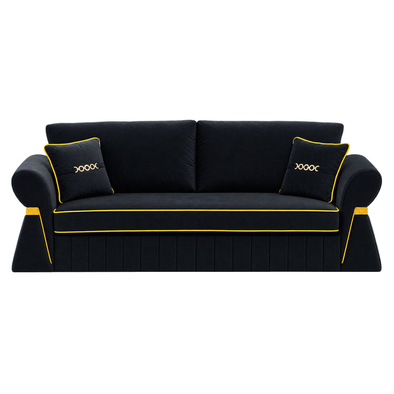 Black three-seat sofa with two cushions and gold-tone piping