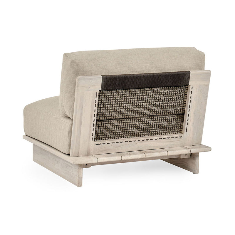 Taupe armless outdoor chair with dark mesh back panel and light wood frame