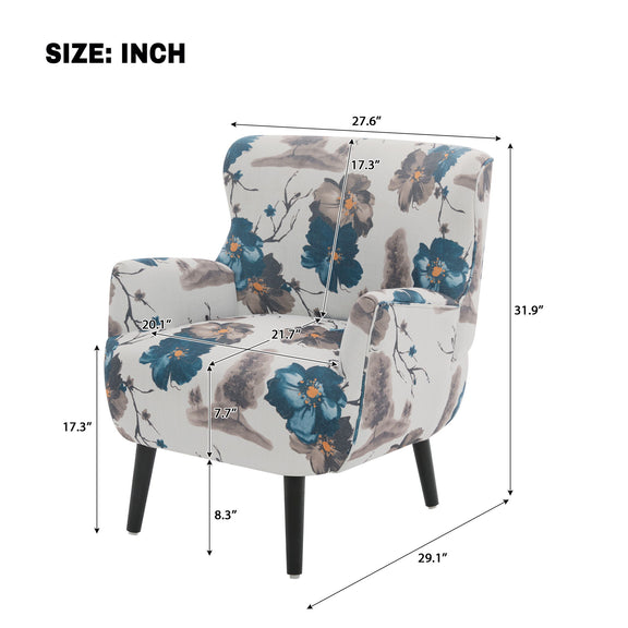 White-and-blue floral upholstered armchair with round arms and tapered black legs