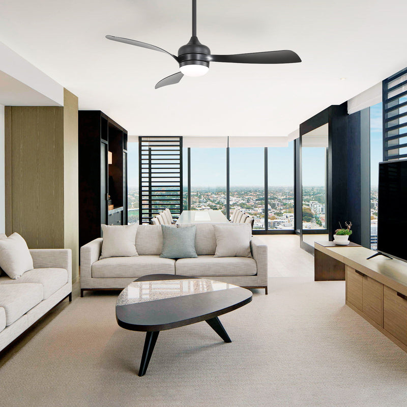 Black ceiling fan with three blades and integrated light fixture on ceiling