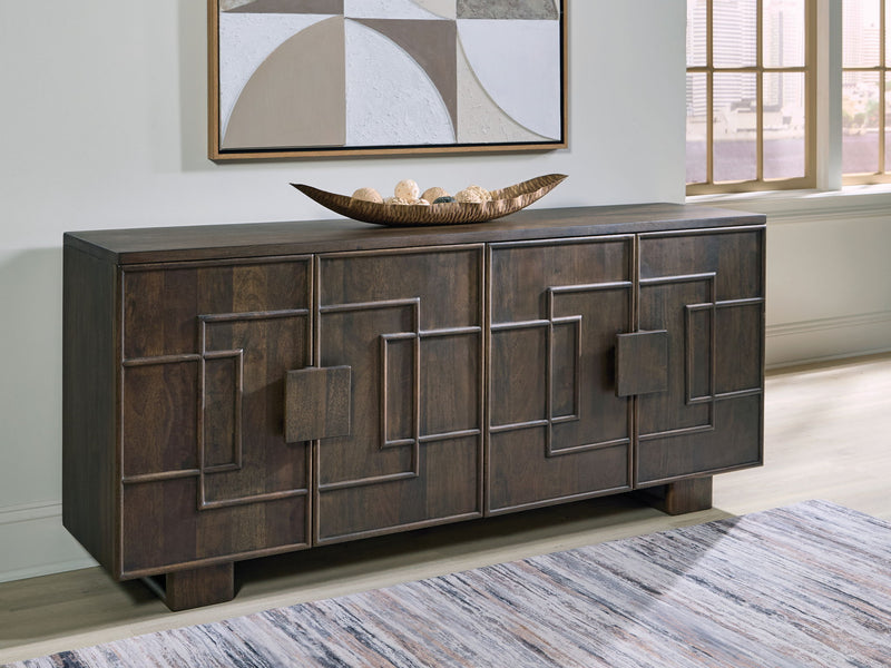 Dark brown accent cabinet with paneled door fronts, silver-toned hinges, and legs