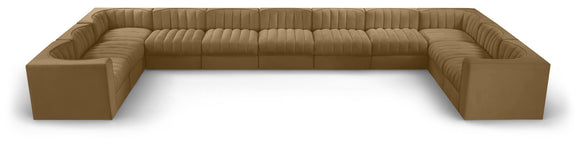 Light brown modular sectional sofa with velvet-look upholstery and tufted cushions