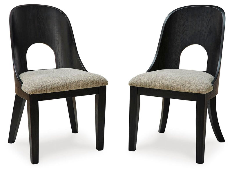 Set of 2 black dining side chairs with arched open backs and beige upholstered seats