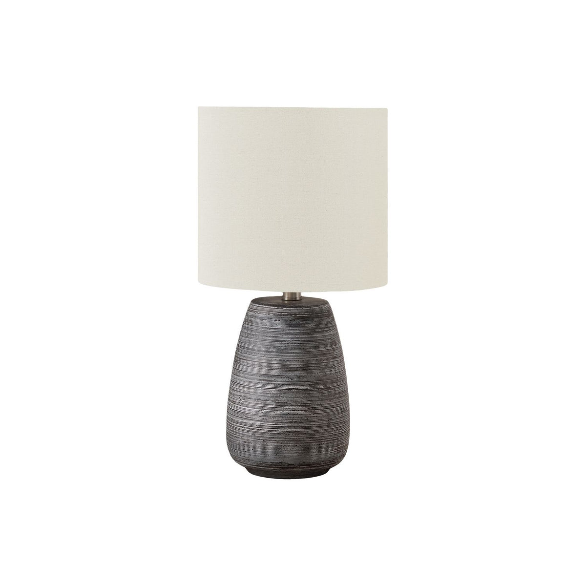 Ceramic table lamp with gray textured base and cream fabric shade