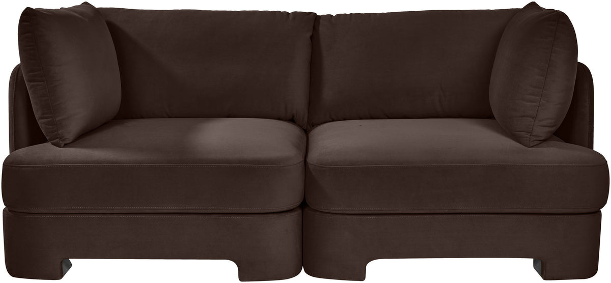 Dark brown velvet upholstered 2-piece loveseat with two seat sections and padded armrests