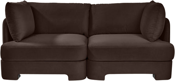 Dark brown velvet upholstered 2-piece loveseat with two seat sections and padded armrests