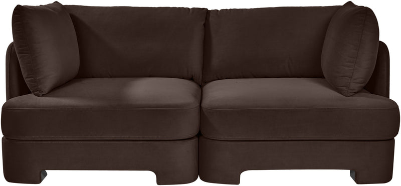Dark brown velvet upholstered 2-piece loveseat with two seat sections and padded armrests
