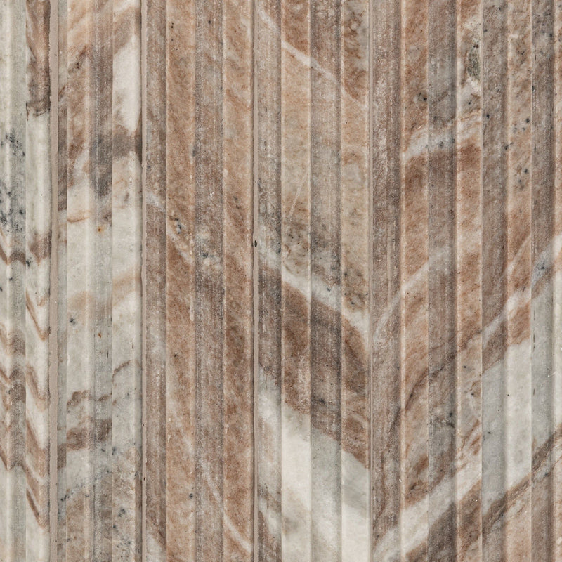 Close-up of marble base with vertical ridged pattern in cream, gray, and brown