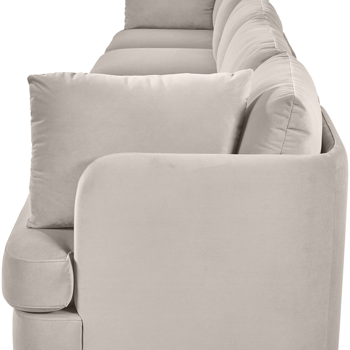 Hammond velvet sectional sofa in light gray, close-up of track arm and seat cushion
