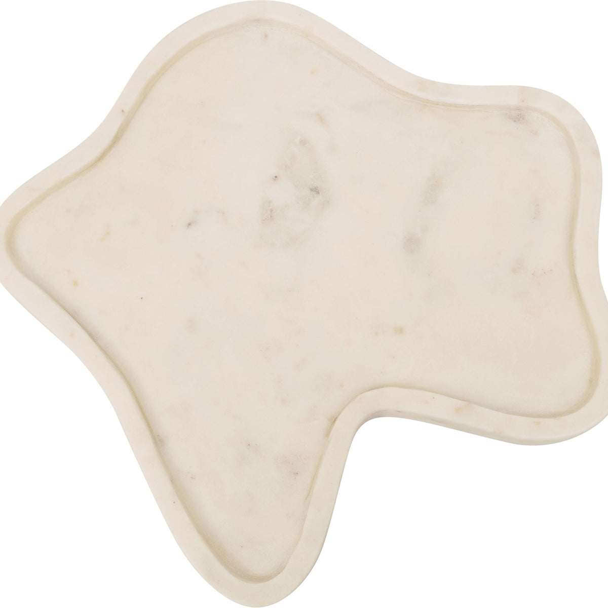 Cream white marble tray with faint speckles and leaf-shaped outline.