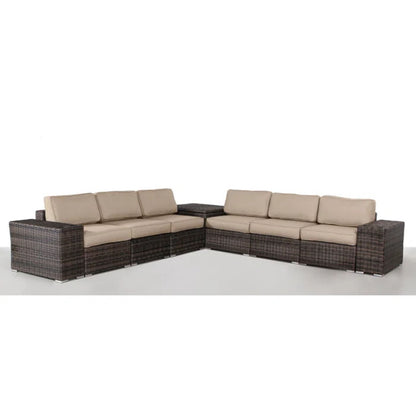 Outdoor rattan wicker corner seating group with light brown seat cushions, dark frame