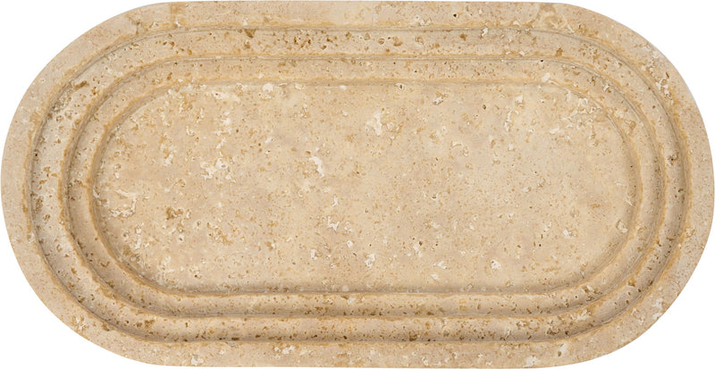 Travertine marble serving tray, oval top view with textured beige surface and concentric grooves.