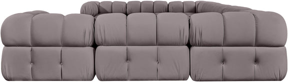 Light gray velvet upholstered sectional sofa with tufted seat and backrest modules