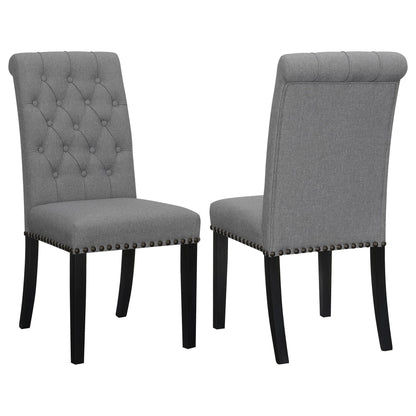 Set of 2 dark gray tufted rolled backrest side chairs with nailhead trim and wood legs