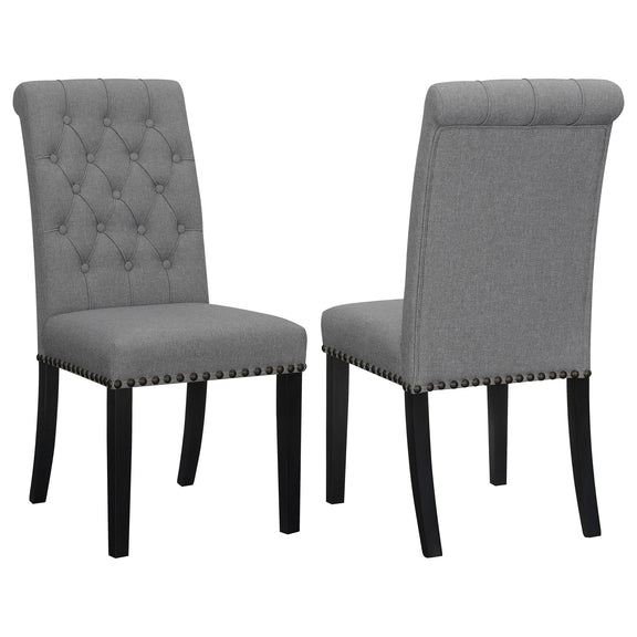 Set of 2 dark gray tufted rolled backrest side chairs with nailhead trim and wood legs