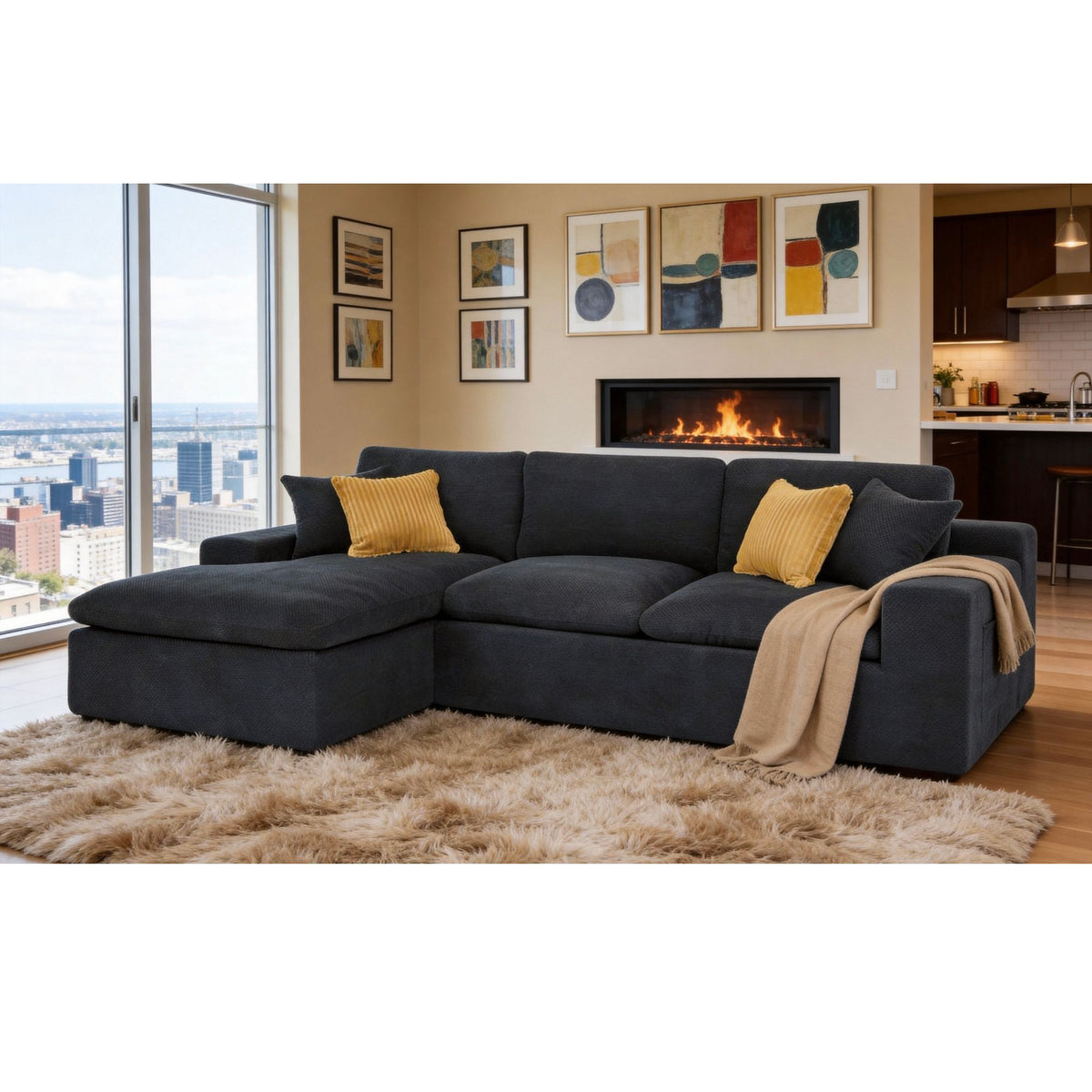 Dark gray U-shaped sectional sofa with chaise, throw blanket, and yellow accent pillows