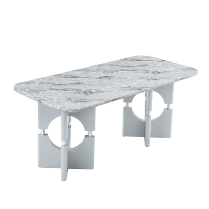 Gray modern dining table with marble-look top and hollow-out pedestal frame