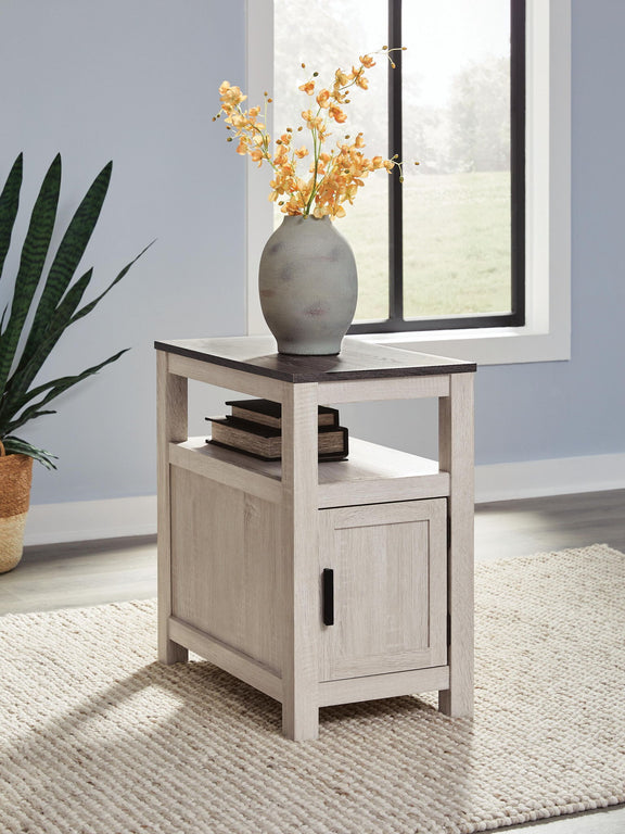 Chair side end table in light gray wood with cabinet door and open shelf