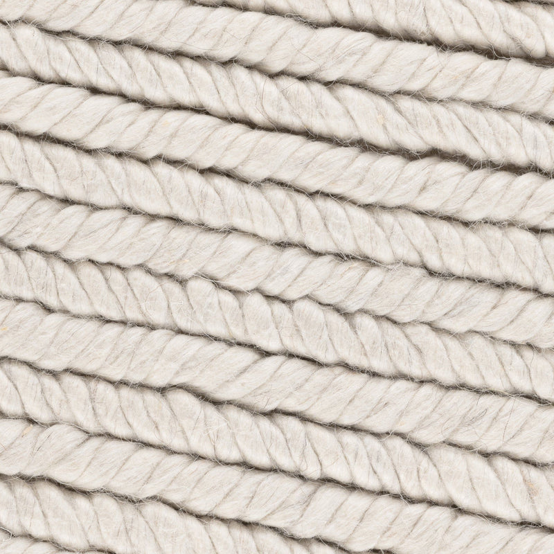 Dawson rug close-up in cream and light gray with braided looped yarn texture