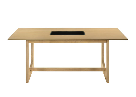 Natural wood dining table with black recessed panel and two straight support legs