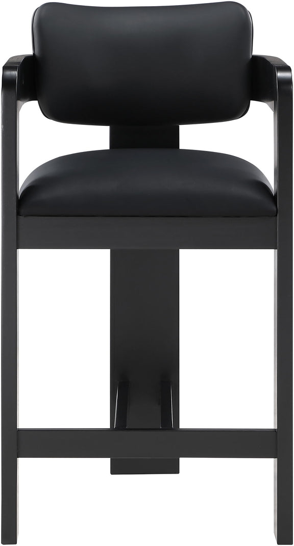Black vegan leather counter stool close-up with curved backrest and black frame