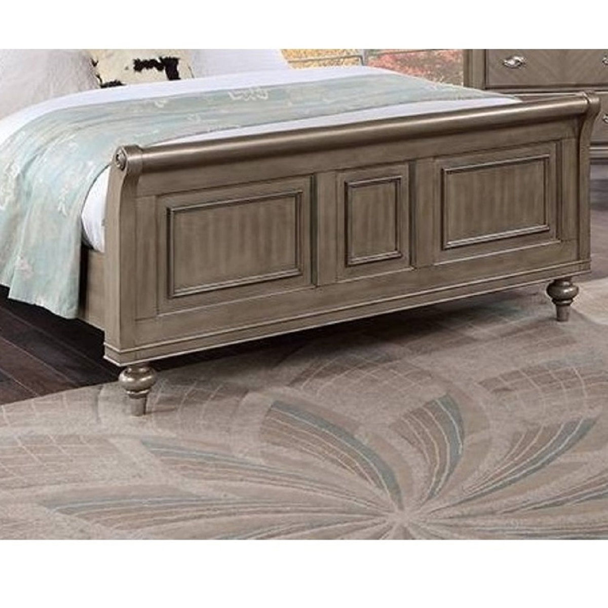 Bronze-tone two-panel headboard with carved panels and turned corner posts