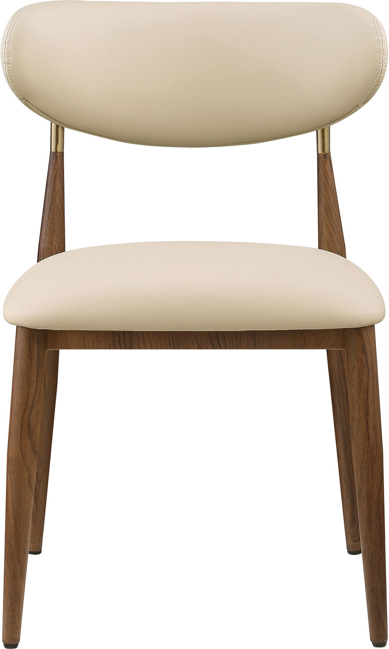 Beige vegan leather dining side chair, close-up view with walnut legs