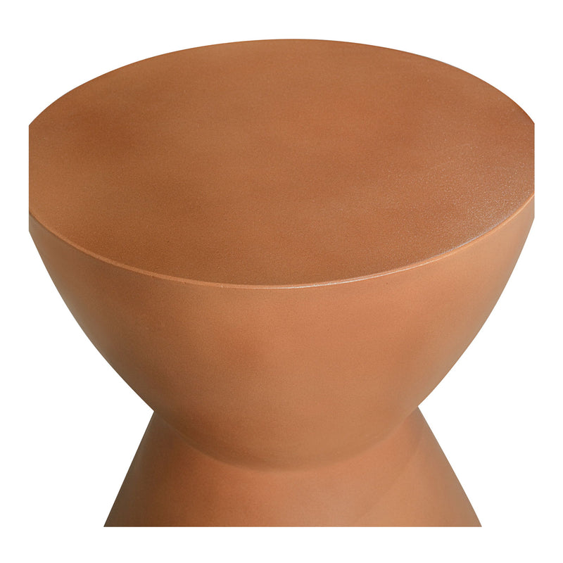 Terracotta stool shown from above, highlighting its round seat and hourglass shape