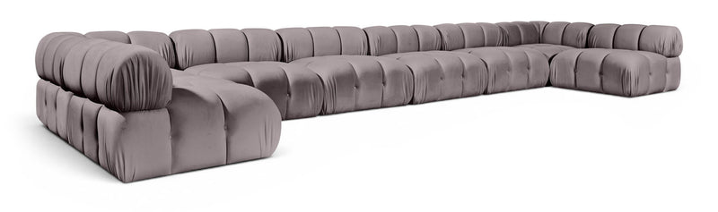 Gray modular sectional sofa with padded chaise and corner modules