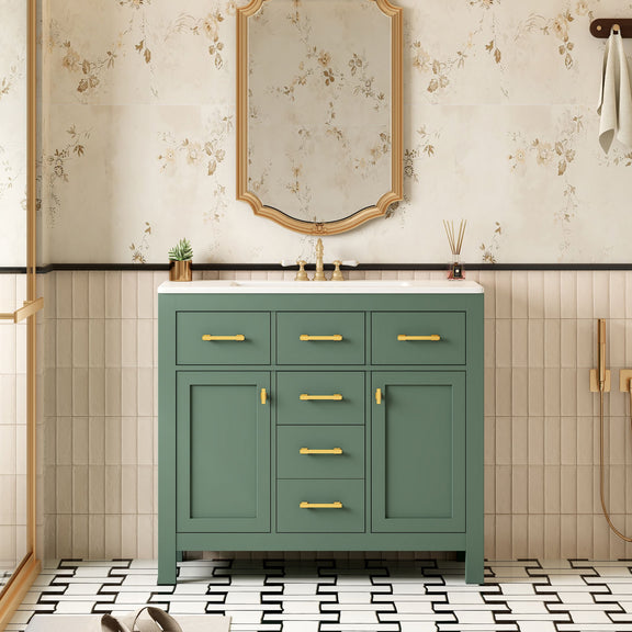 Dark green bathroom vanity with white sink, four drawers, two doors, and gold-tone pulls