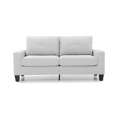 White faux leather modular sofa with tufted back and rounded seat arms