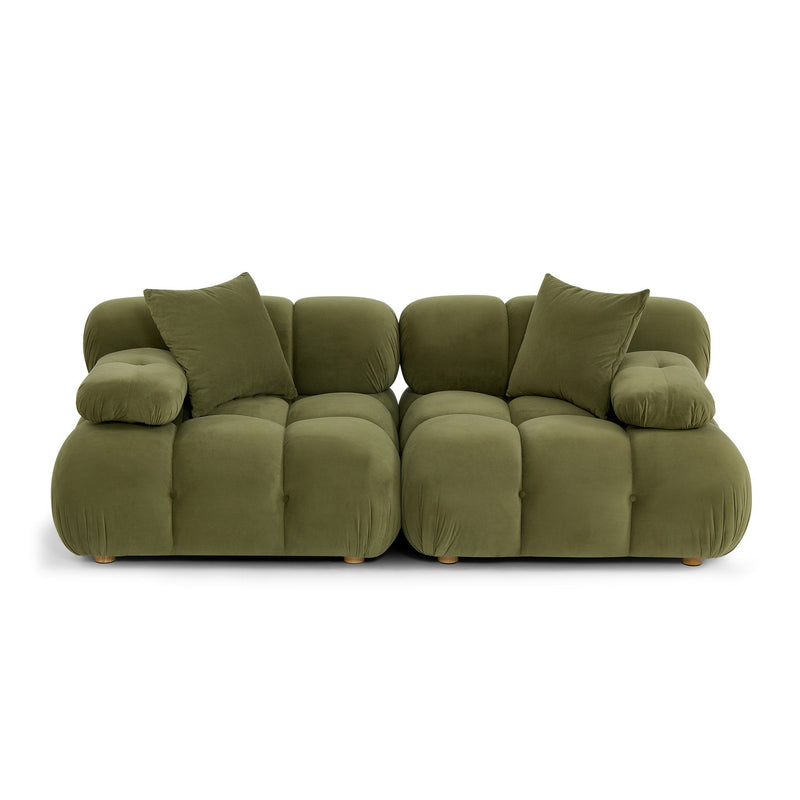 Olive green modular loveseat with plush cushions and square throw pillows, low profile