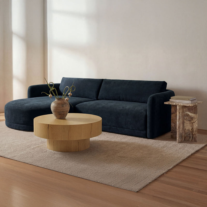 Dark blue sectional sofa with left chaise and wide seat cushions