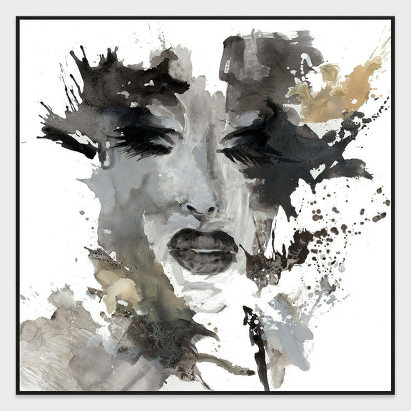 Framed abstract portrait artwork showing grayscale face with tan blotches and black ink marks