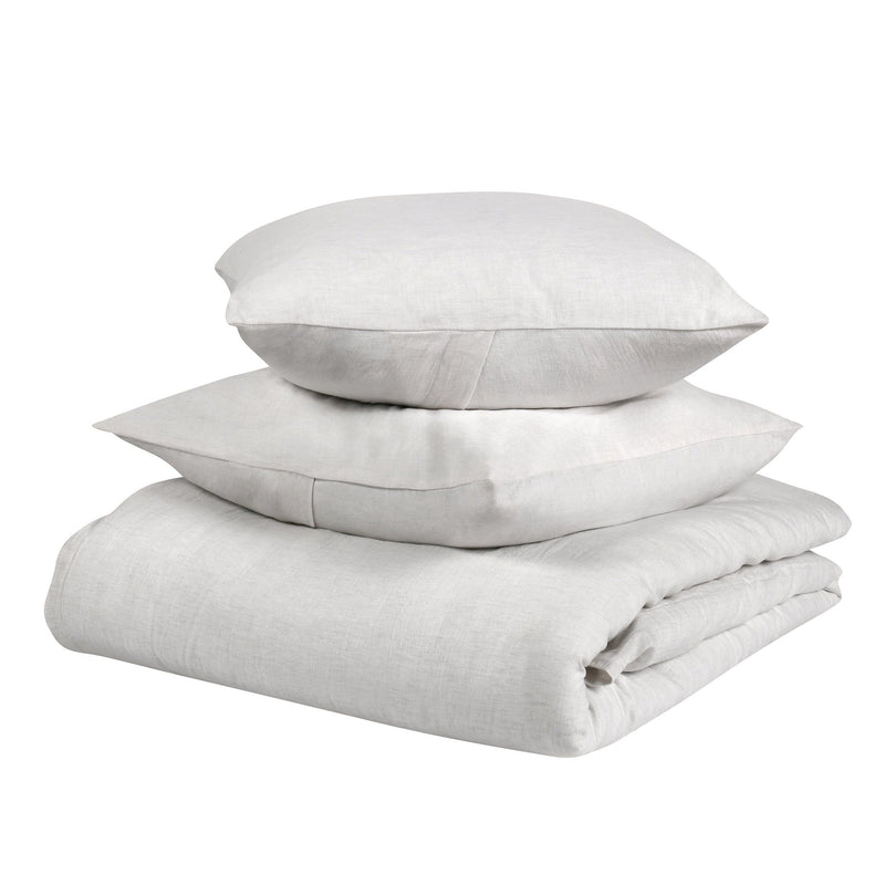 Linen cashmere duvet set in white with stacked duvet and two white pillows
