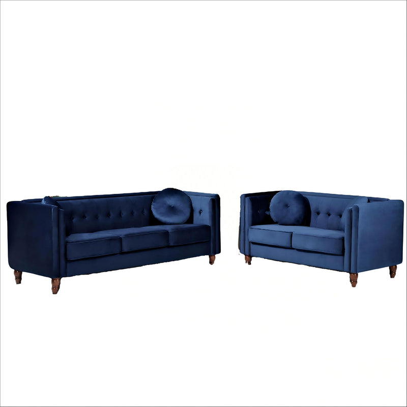 Dark blue 2-seater velvet loveseat with tufted back and round accent pillows