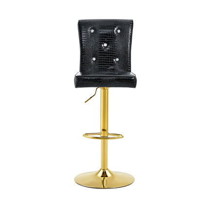 Black lift barstool chair with button-tufted back and gold round base, padded seat
