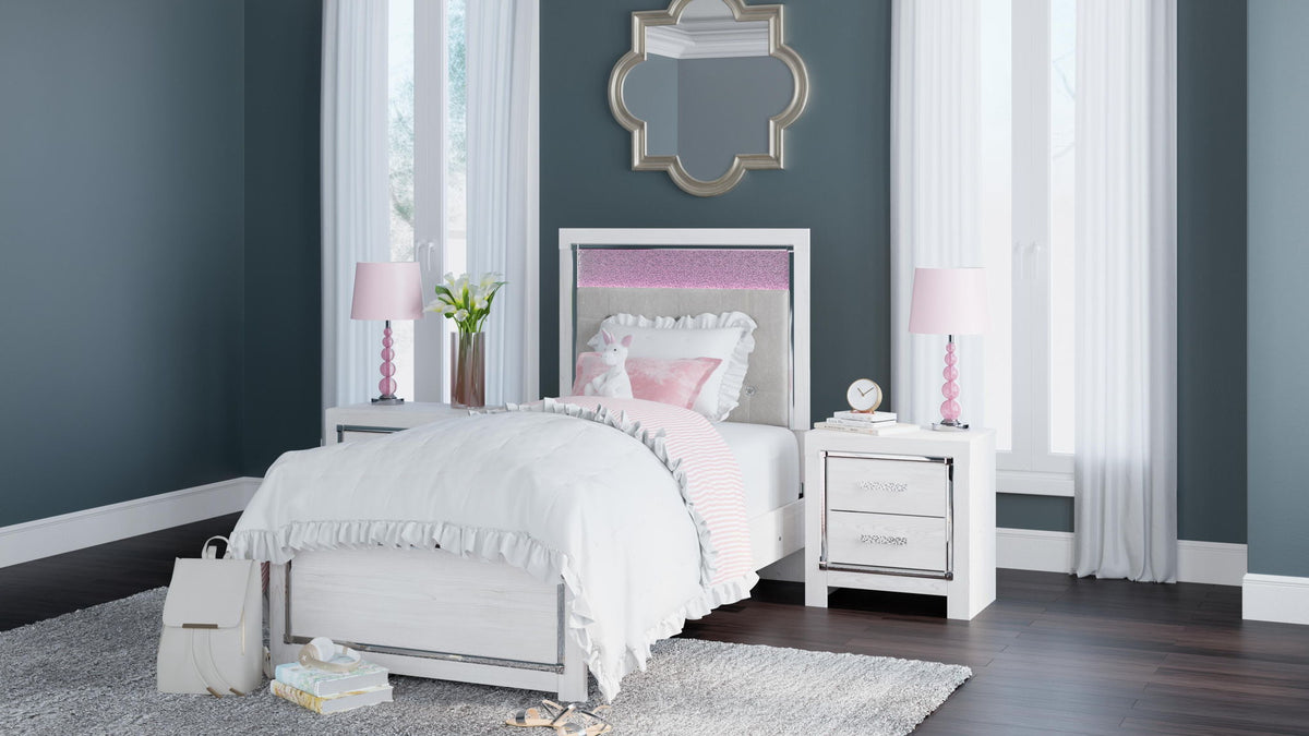 White panel bed styled in a room with tufted gray headboard and soft bedding