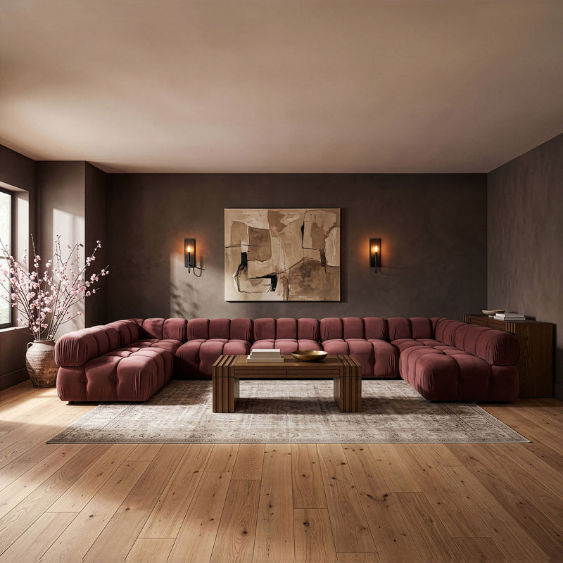 Burgundy modular U-shaped sectional sofa with tufted seat cushions and corner modules